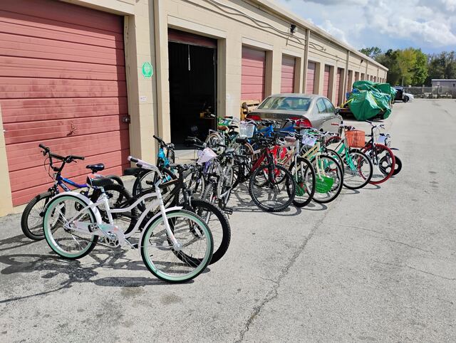 Bikes for sale lined up outside the shop doors