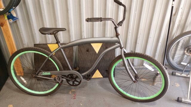 Matte black cruiser with lime green rims