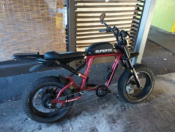 Red moped-style electric bike with fat tires