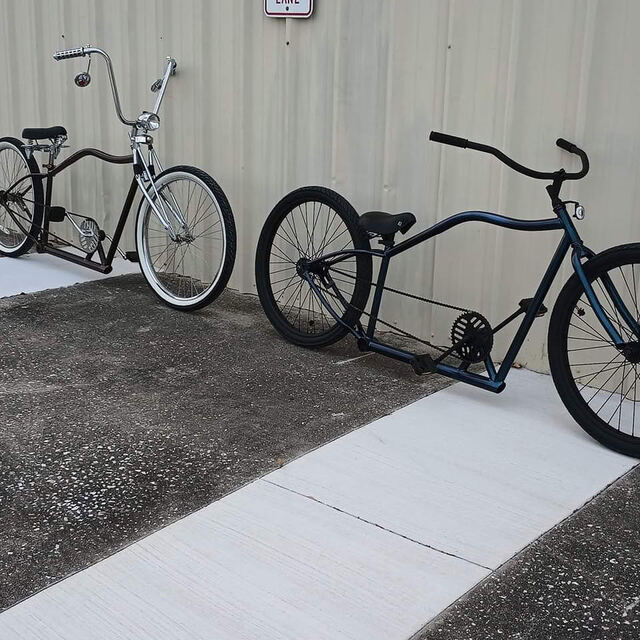 Two stretch builds parked along the walkway