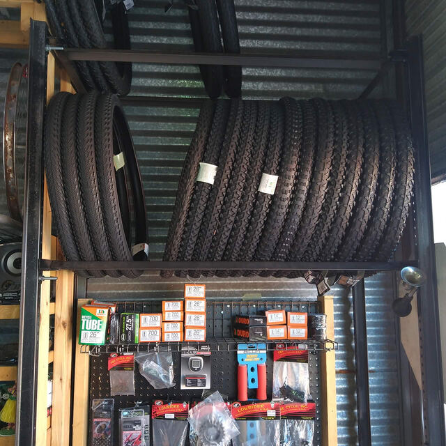 Wall of fresh tires and parts inventory