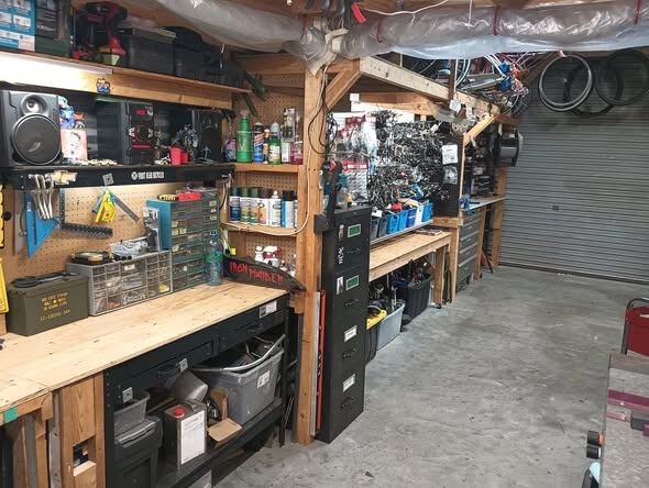 Organized workbench inside the shop, stocked and ready